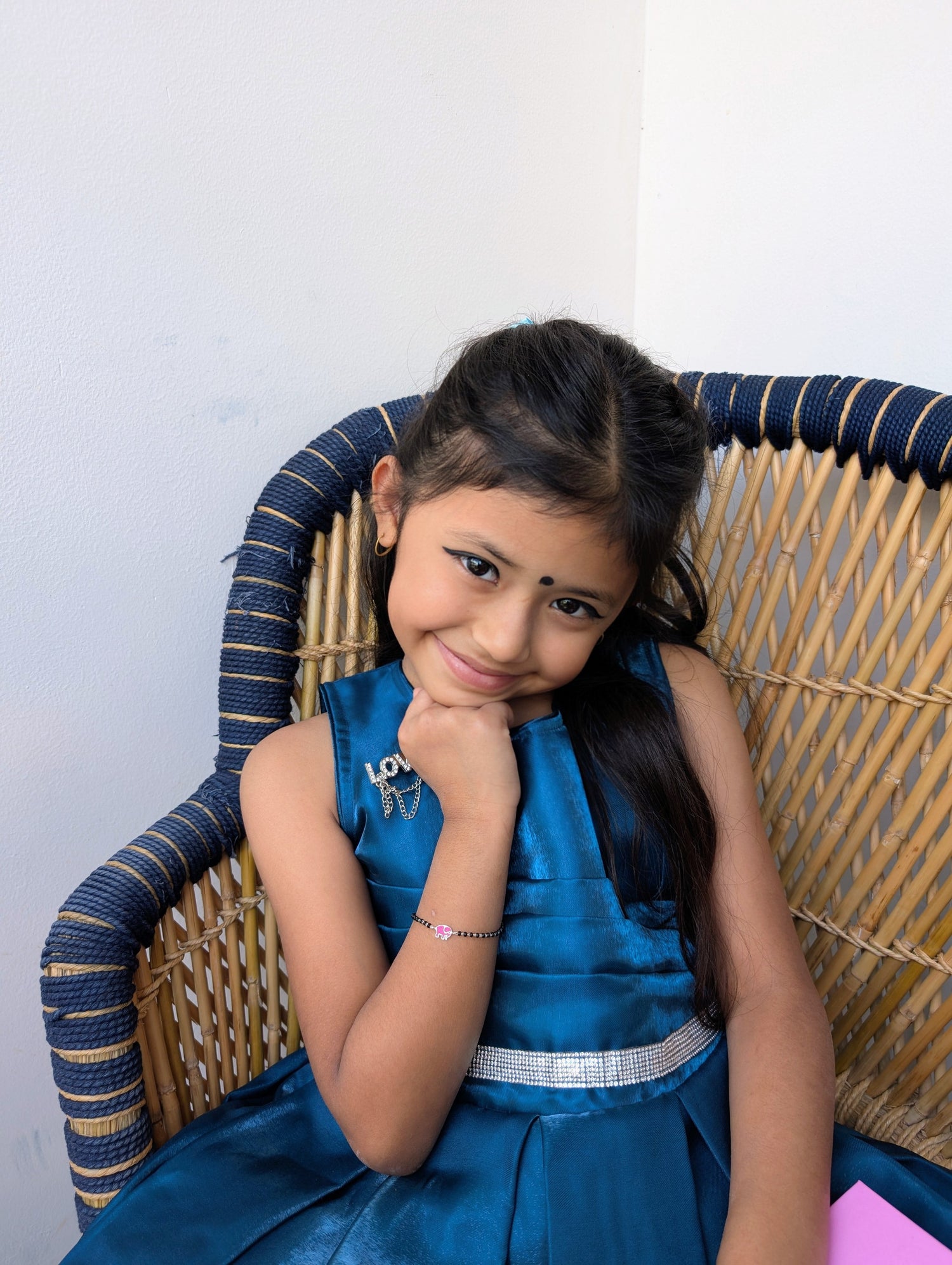 kid wearing properly fitted silver bracelet and anklet, showcasing safe and comfortable jewelry sizing for active young children.