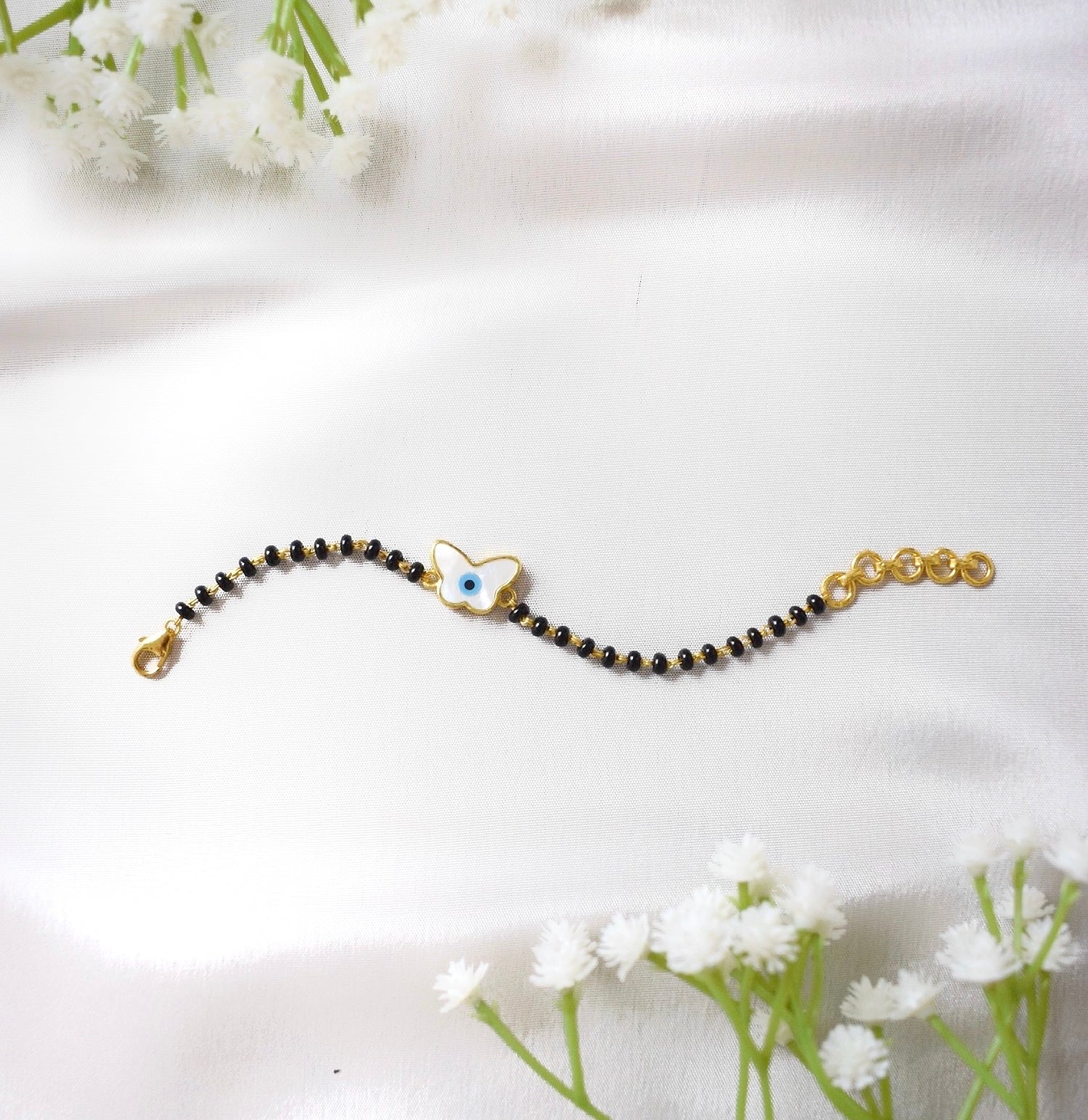 FlyGuard Nazariya – Butterfly & Evil Eye Protection with Black Beads