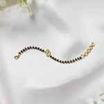 TinySteps Nazariya – 925 Silver Baby Foot Charm with Black Beads