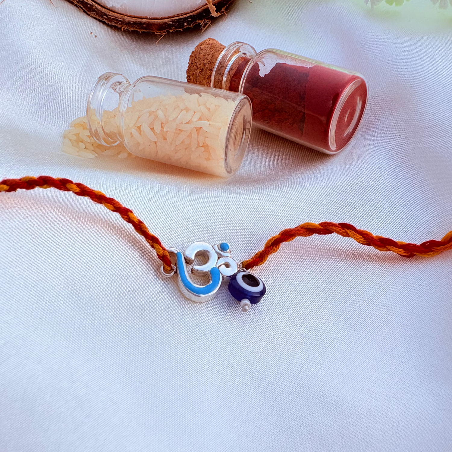 ShubhOm Rakhi – Adjustable Thread Rakhi with 925 Silver OM Charm