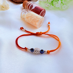NazarRaksha Rakhi – Evil Eye Thread Rakhi with 925 Silver Charm