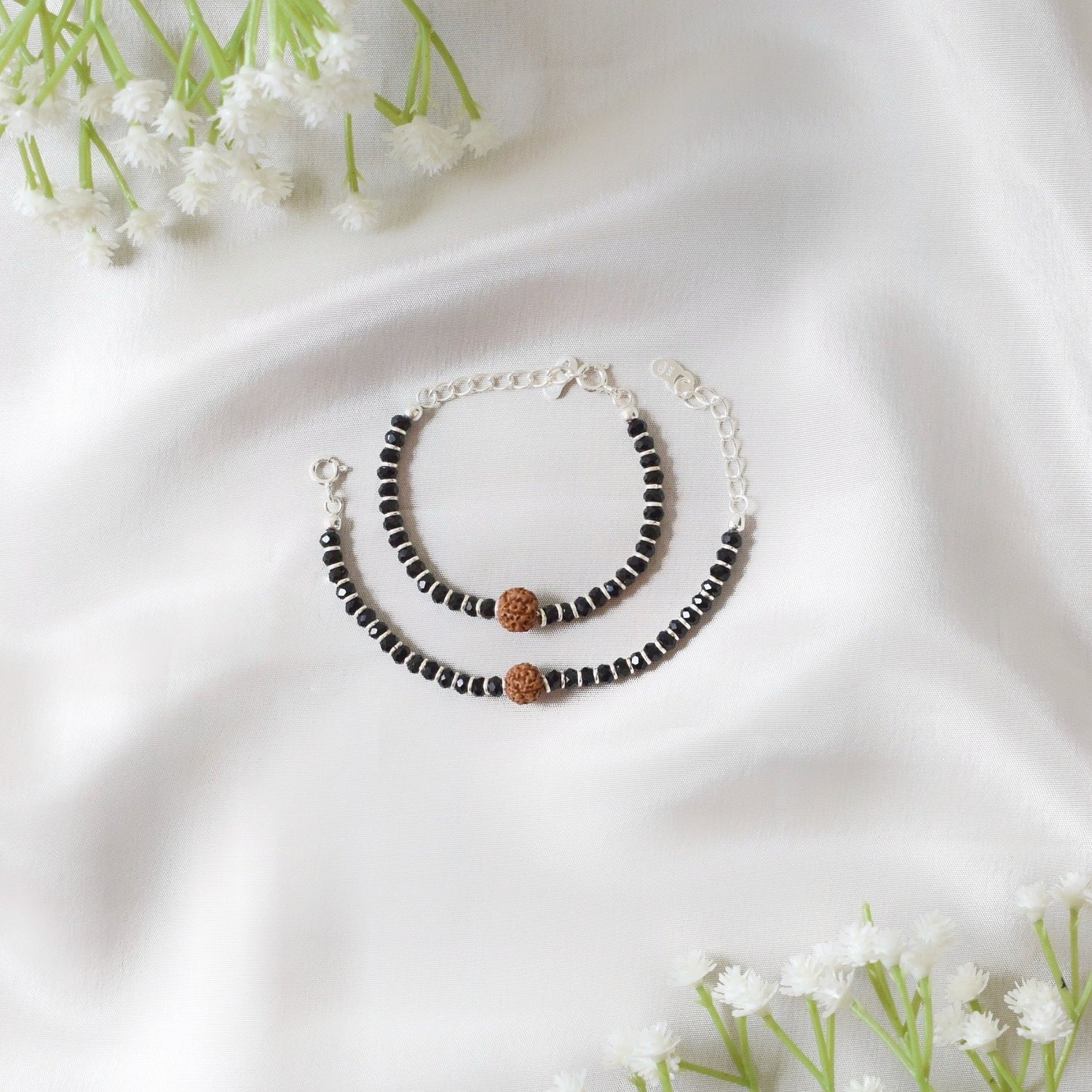 RudraRaksha Nazariya – Black Beads Bracelet with Sacred Rudraksh Charm