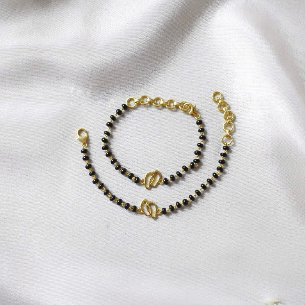 TinySteps Nazariya – 925 Silver Baby Foot Charm with Black Beads