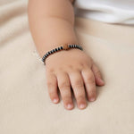 RudraRaksha Nazariya – Black Beads Bracelet with Sacred Rudraksh Charm