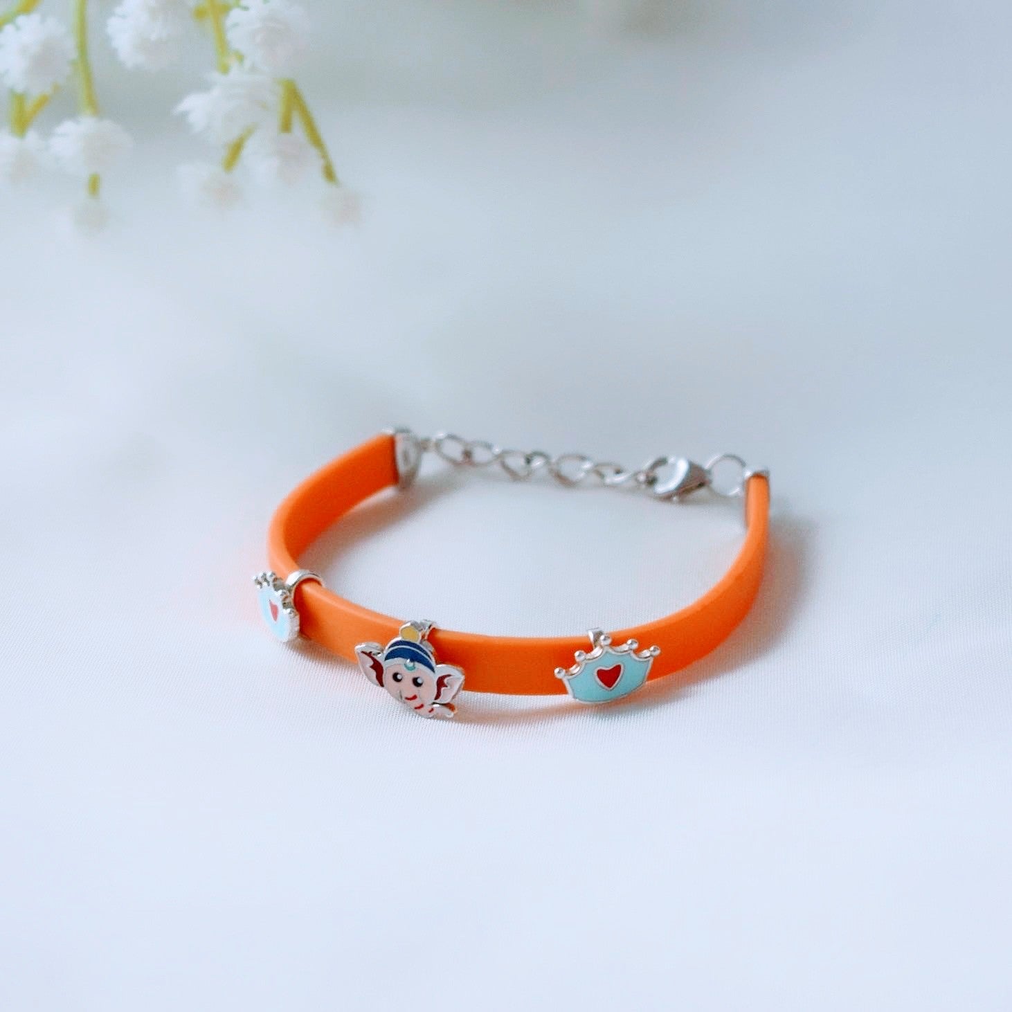 DivineGuard Bracelet – Rubber Band with Ganesha & Crown Charms